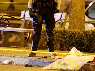 A targeted shooting on a popular waterfront Coal Harbour street left at least one person dead Saturday night.