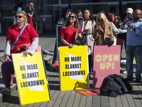 A protest gathering at Jack Poole Plaza Saturday saw business owners and supporters rally against COVID-19 shutdowns and restrictions.