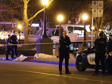 A targeted shooting on a popular waterfront Coal Harbour street left at least one person dead Saturday night.