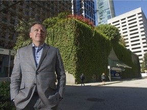 Jon Stovell of Reliance Properties stands near a parking garage at the corner of Melville and Thurlow streets in Downtown Vancouver on April 14.