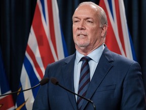 Premier John Horgan  keeps talking about travel restrictions, but they haven't happened.