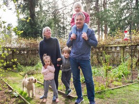 Pete McMartin and wife Susan, with grandkids Ewan, 5, Pim, 3, and Hazel, 2, and dog Bess in Tsawwassen on March 31.