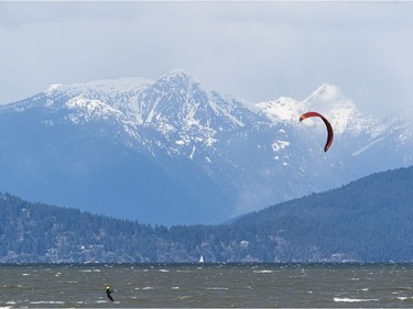 VANCOUVER,BC:APRIL 4, 2021 -- A kitesurfer takes advantage of the windy conditions at Spanish Banks in Vancouver, BC, April, 4, 2021. (Richard Lam/PNG) (For ) 00064274A [PNG Merlin Archive]