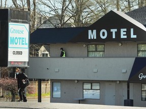 The scene at the Grouse Creek Motel at 9414 King George Blvd on April 15, 2021, the morning after a male was shot and transported to hospital by paramedics.
(NICK PROCAYLO/POSTMEDIA) 



00064380A ORG XMIT: 00064380A [PNG Merlin Archive]