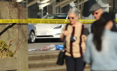 Yellow tape outside Cardero's Restaurant on the Coal Harbour Quay on April 18, 2021, one day after police responded to a shooting that left one person dead and another hospitalized.