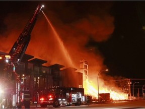 A three-alarm fire engulfed an apartment complex under construction at 208th Street and 80th Avenue in the Township of Langley on Monday night and Tuesday.