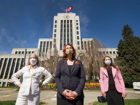 VANCOUVER, BC - April 21, 2021  - Three NPA Vancouver Councillors, Left to right: Colleen Hardwick, Sarah Kirby-Yung and Lisa Dominato in front of Vancouver City Hall in Vancouver, BC, April 21, 2021. 

Photo by Arlen Redekop / Vancouver Sun / The Province (PNG) (story by Dan Fumano) [PNG Merlin Archive]