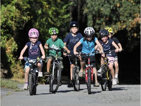 File photo of kids riding bikes in New Westminster.