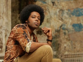 Alex Cuba. Latin Grammy Award-winning musician in promo shot for album Sublime release.