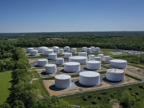 In an aerial view, fuel holding tanks are seen at Colonial Pipeline's Dorsey Junction Station on May 13, 2021 in Washington, DC.