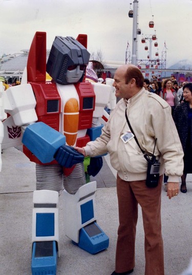 May 1986. Jimmy Pattison with Transformer " Star Scream" at Expo 86. Province photo files. Sunday feature Expo 86 30th anniversary [PNG Merlin Archive]