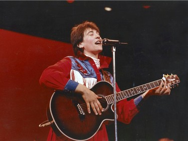K.D.Lang. KD Lang at Expo 86: dazzling versatility, stunning costume. Ran May 20, 1986 pg. C7 Vancouver Sun. Peter Battistoni Vancouver Sun. TC # 86-2265 [PNG Merlin Archive] Sunday feature Expo 86 30th anniversary