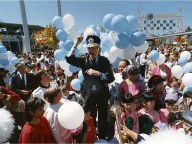 Expo 86 - Entertainment. Danny Kaye dons hat of Petaluma Trojan Marching Band. Ran June 2, 1986 pg. 4 Province. Colin Price Province. TC # 86-3630 Sunday feature Expo 86 30th anniversary [PNG Merlin Archive]