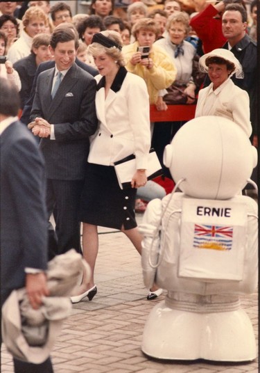 Prince Charles and Princess Diana at Expo 86 with Expo Ernie in the foreground. Photo was taken in May of 1986. Province photo files ( no phtographer or twin check listed) [PNG Merlin Archive] Royal Fascination