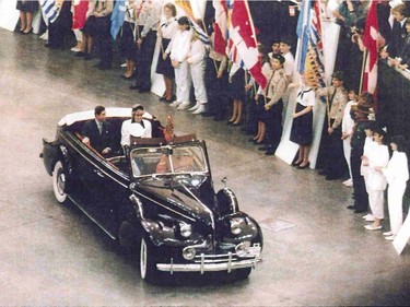 Driving Section              2-10-2;   4-2;  4-3;  4-11:  Prince Charles and Princess Diana in the 1939 McLaughlin Buick Royal Tour car in BC Place during the opening ceremonies for Expo 86 in Vancouver                   [PNG Merlin Archive]