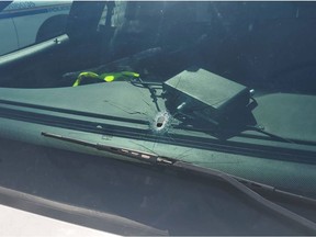 A police vehicle with a bullet hole after officers responded to a shooting incident at Vancouver International Airport (YVR) on Sunday, May 9.