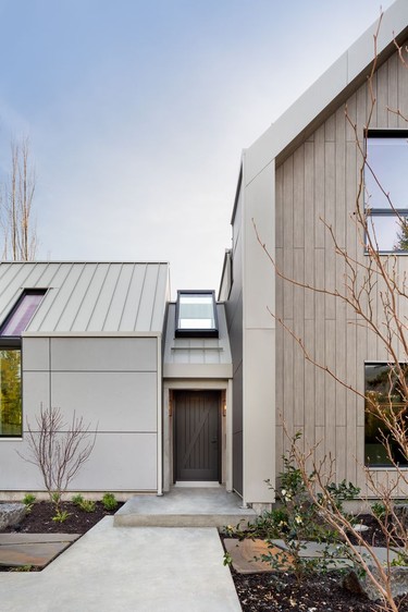 A central entryway divides the private home from the office, allowing clients to come and go without walking through the private areas of the home.