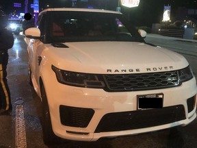 North Vancouver RCMP seized cash, drugs and a knife from occupants of a Range Rover during an impaired driving road block on May 18, 2021.
