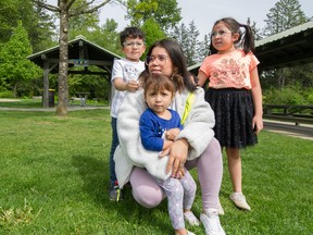 Mom Lidia Villegas with children Ariana, 7, Rafael, 5 and two-year-old Mayra.