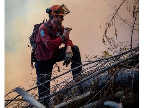 A B.C. Wildfire Service firefighter at the Doctor Creek blaze in south-east B.C.