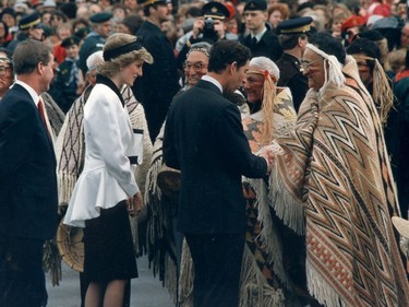 Prince Charles and Lady Diana greet members of the Musqueam band after they arrived at the Expo site Friday.  Band members danced for the royal visitors as they ended their False Creek cruise.