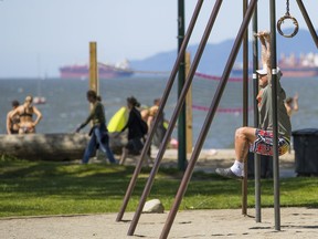 People enjoying the weather at Kitsilano beach earlier this month.