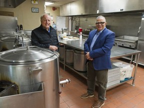 The Italian Cultural Centre's executive director, Mario Miceli (right), with catering director Fabio Rasotto in the grand ballroom's kitchen.