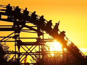 Fair goers take in the last night of the PNE riding into the setting sun (on the roller coaster) at the end of a glorious long weekend  on  September  3, 2012