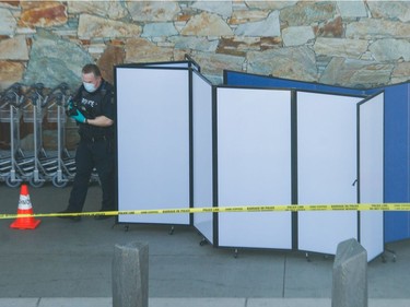 Police investigate a shooting at YVR in Richmond, BC, May 9, 2021.
Photo by Arlen Redekop / Vancouver Sun / The Province (PNG) (story by Kim Bolan) [PNG Merlin Archive]