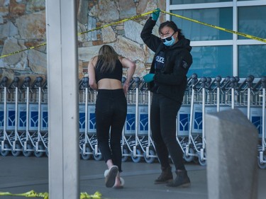 Police investigate a shooting at YVR in Richmond, BC, May 9, 2021.
Photo by Arlen Redekop / Vancouver Sun / The Province (PNG) (story by Kim Bolan) [PNG Merlin Archive]