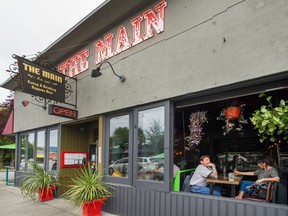 People enjoy eating/drinking inside restaurants, cafes and bars like The Main in Vancouver, BC, May 30, 2021 after six weeks of restrictions.