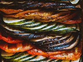 Ribbon-like rows of sliced zucchini, eggplant and tomatoes make Rebekah Peppler’s Summer Tian visual as well as culinary feast.