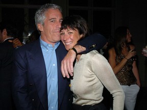 Jeffrey Epstein and Ghislaine Maxwell attend a benefit gala on March 15, 2005 in New York City.