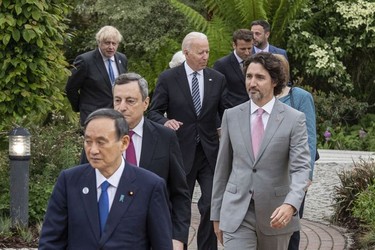 British Prime Minister Boris Johnson, German Chancellor Angela Merkel, French President Emmanuel Macron,  Japanese Prime Minister Yoshihide Suga, Canadian Prime Minister Justin Trudeau, Italian Prime Minister Mario Draghi and United States President Joe Biden arrive for a drinks reception for Queen Elizabeth II and G7 leaders at The Eden Project during the G7 Summit on June 11, 2021 in St Austell, Cornwall, England.