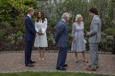 Prince William, Duke of Cambridge, Catherine, Duchess of Cambridge, Camilla, Duchess of Cornwall and Prince Charles, Prince of Wales chat with Canadian Prime Minister Justin Trudeau at a drinks reception for Queen Elizabeth II and G7 leaders at The Eden Project during the G7 Summit on June 11, 2021 in St Austell, Cornwall, England.