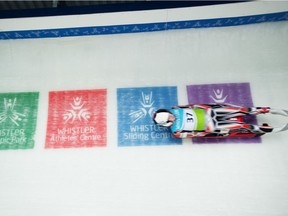 A Canadian athlete on the last turn of the Whistler Sliding Centre Centre on Dec. 4, 2014. Garrett Reid was seriously injured on the track in 2019.