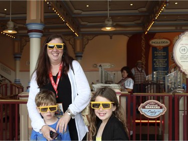 Shelley Fralic and grandchildren Charley and Jack gear up for some 3D fun in Toy Story Midway Mania at California Adventure.