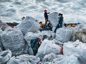 Crews work to remove marine debris from B.C.'s coastline. Photo: Simon Ager/Wilderness Tourism Association of B.C.