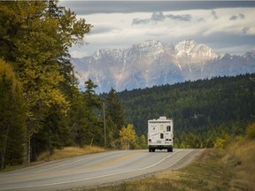 A camper on Highway 3 heading east towards the Steeples outside of Cranbrook.