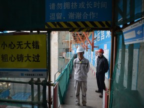 File photo: Workers at the joint Sino-French Taishan Nuclear Power Station outside the city of Taishan in Guangdong province on December 8, 2013.