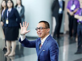 Richard Li, Hong Kong businessman and younger son of tycoon Li Ka-shing, waves as he arrives to vote during the election for Hong Kong's next Chief Executive in Hong Kong, China March 26, 2017.