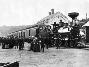 Men and women gathered at platform in Port Moody next to the C.P.R. locomotive that pulled the first passenger train to Burrard Inlet, July 4, 1986. Vancouver Archives AM54-S4-: Can P4