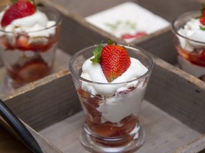 Combine fresh local strawberries with stewed rhubarb, crumbled meringue and whipped cream for a quick, easy seasonal dessert, food columnist Jill Wilcox says. (Derek Ruttan/The London Free Press)