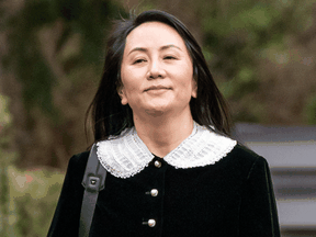 Meng Wanzhou, chief financial officer of Huawei, leaves her home for her trip to B.C. Supreme Court for her extradition hearing, in Vancouver, April 1, 2021.