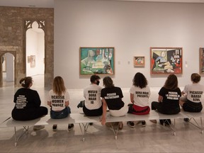 Students protest inside Picasso Museum in Barcelona, Spain, May 27, 2021.