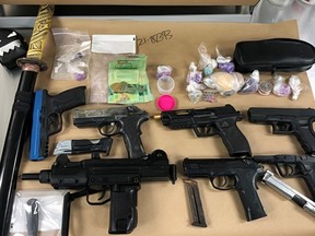 Surrey RCMP seized a quantity of drugs and cache of weapons during a recent traffic stop in Whalley.