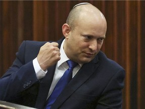 Naftali Bennett gestures during a special session of Israel's parliament, on June 2, 2021.
