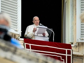 Pope Francis speaks from the window of the apostolic palace overlooking St. Peter's square in the Vatican during the weekly Angelus prayer on June 6, 2021.