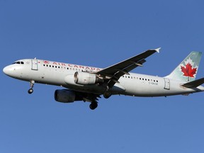 An Air Canada Airbus A320-200 airplane prepares to land at Vancouver's international airport in Richmond.