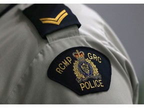 FILE PHOTO: A Royal Canadian Mounted Police (RCMP) crest is seen on a member's uniform, at the RCMP "D" Division Headquarters in Winnipeg, Manitoba Canada, July 24, 2019.   REUTERS/Shannon VanRaes/File Photo